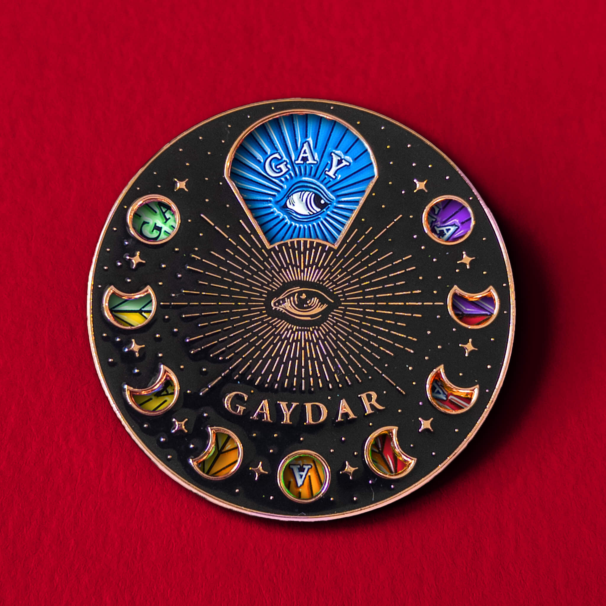 Gaydar spinning pin — enamel pin