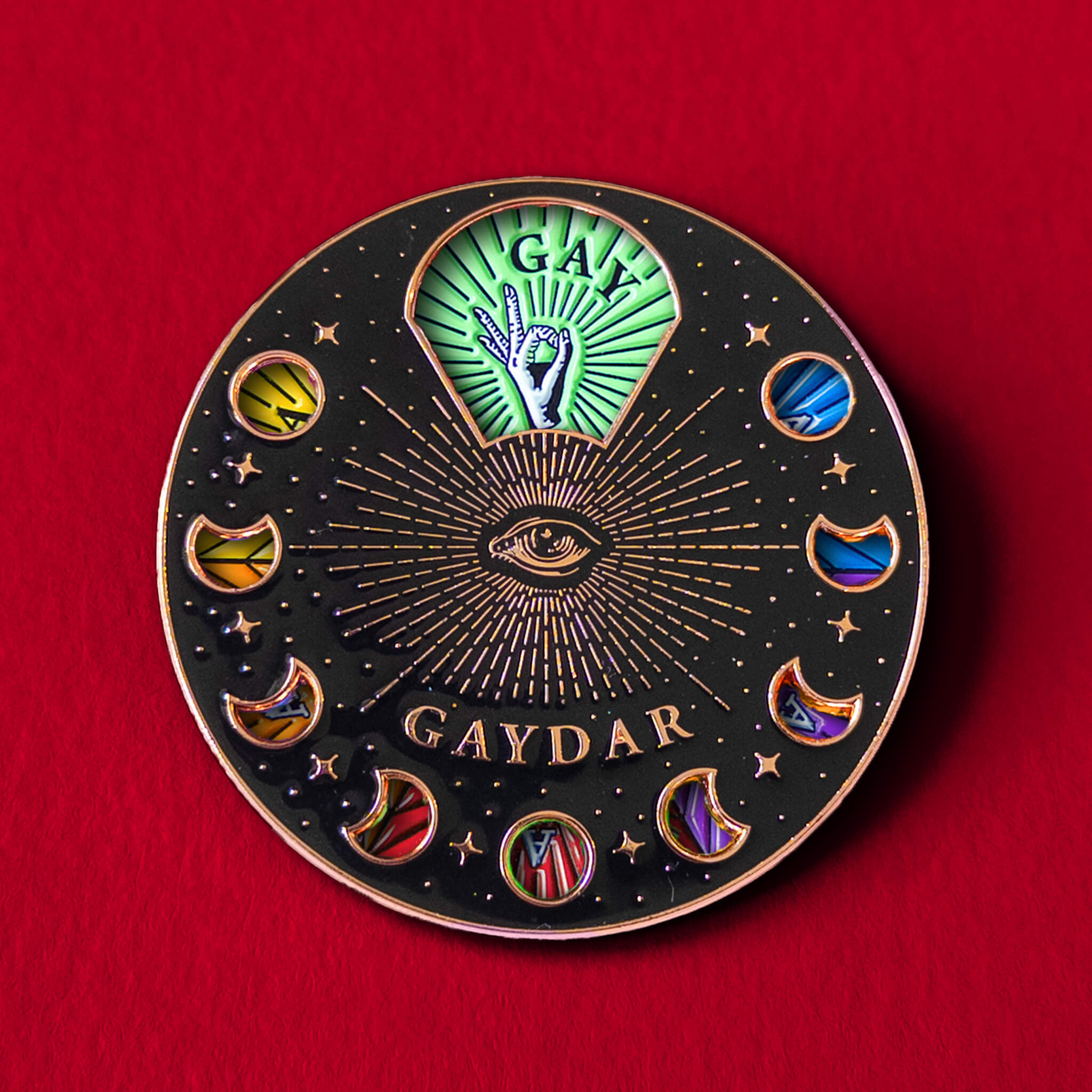 Gaydar spinning pin — enamel pin