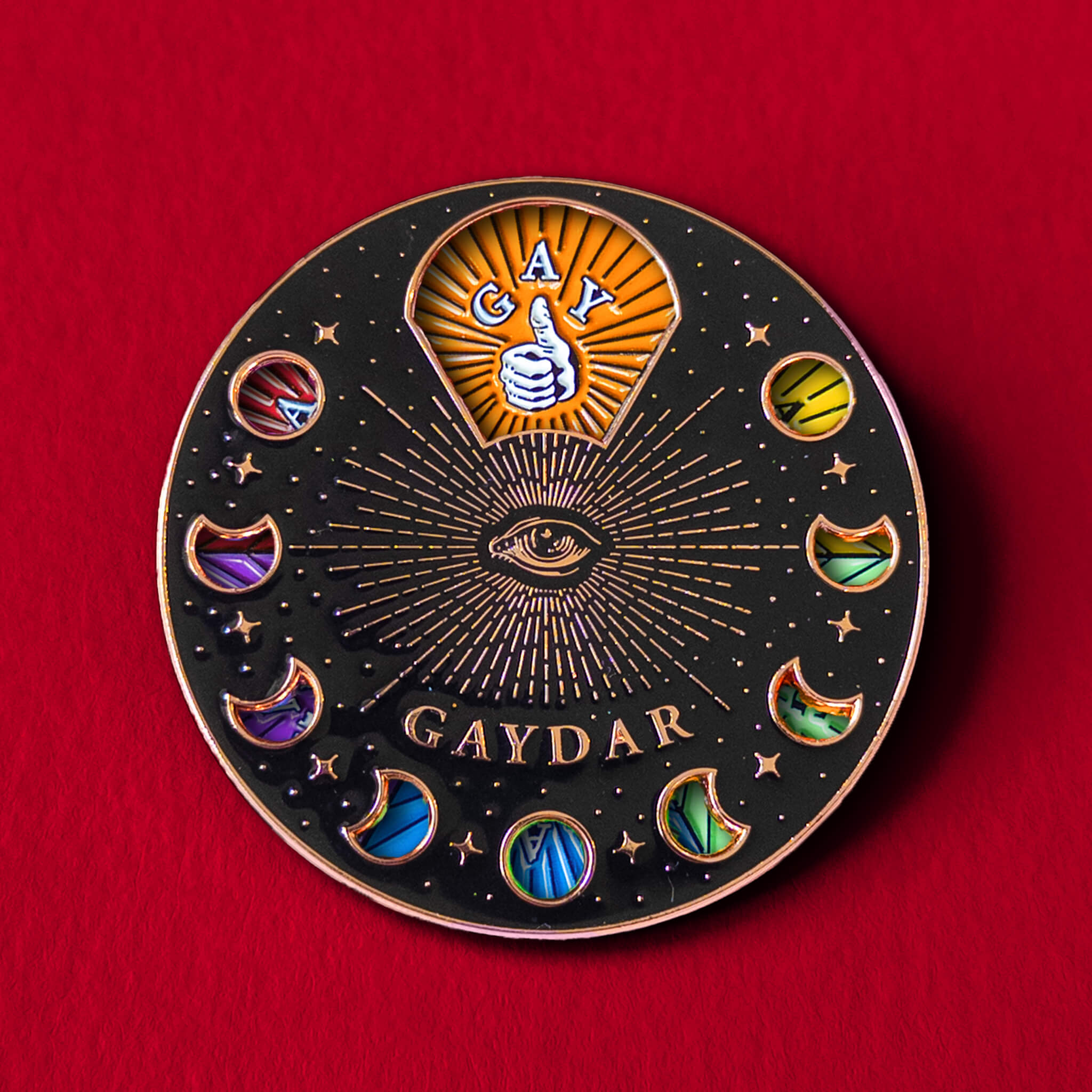 Gaydar spinning pin — enamel pin