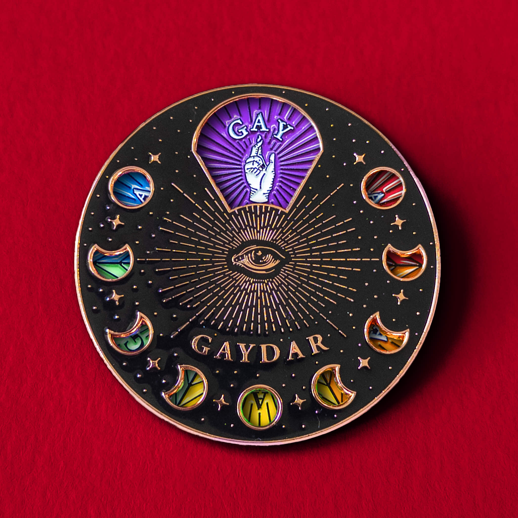 Gaydar spinning pin — enamel pin