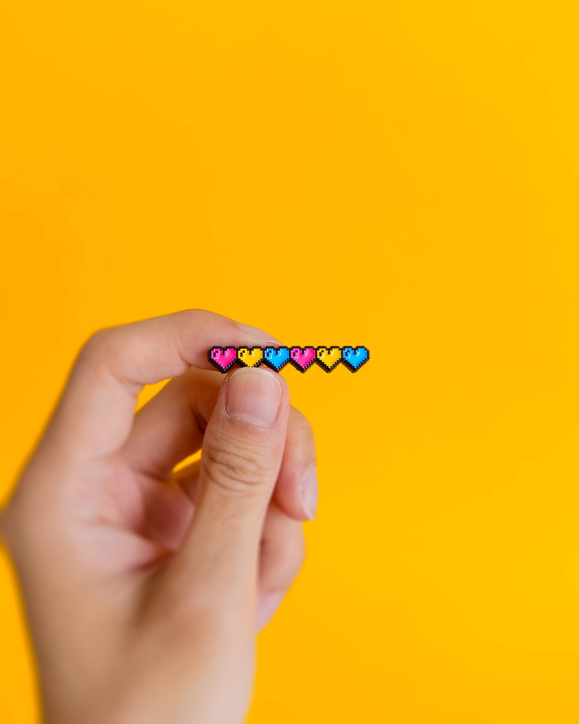 Pixel hearts (pansexual) — enamel pin