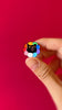 Rainbow flower cat — enamel pin