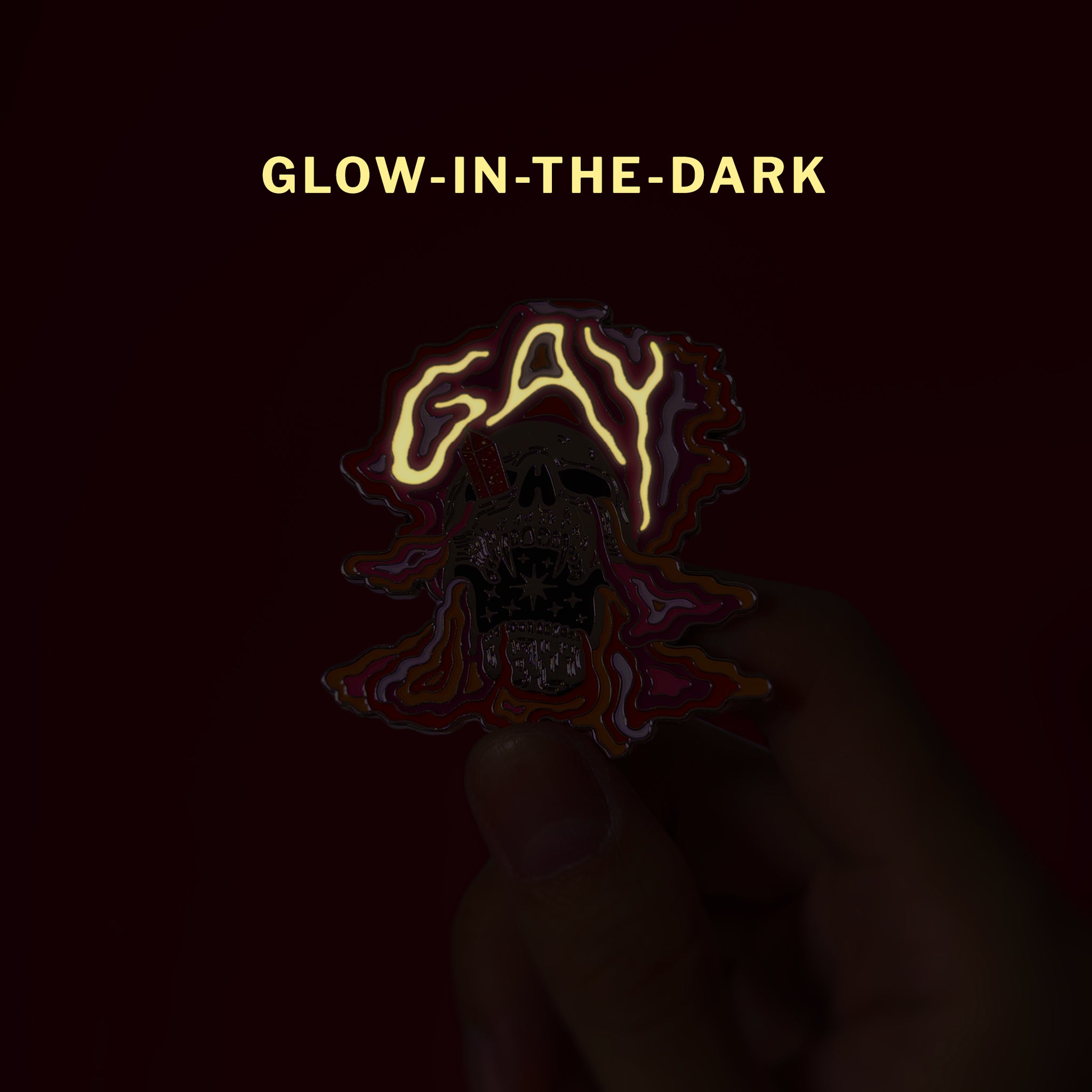 Glow-in-the-dark skull (lesbian) — enamel pin