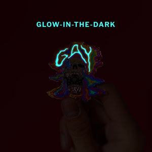 Glow-in-the-dark skull (rainbow) — enamel pin